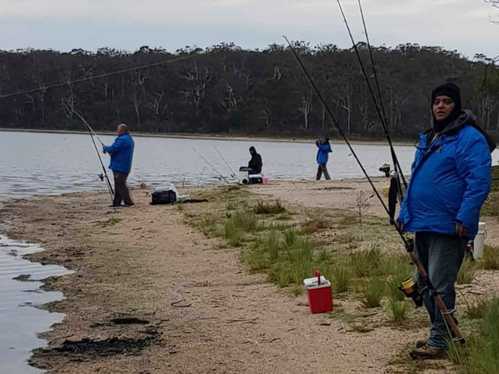 a group of men fishing